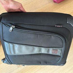 Tumi T-tech 4-wheel carry-on